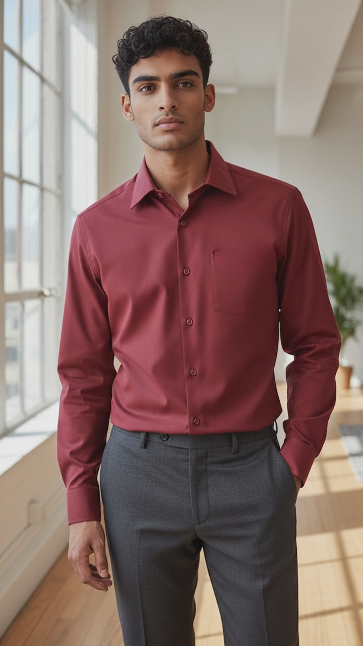 man wearing a burgundy dress shirt